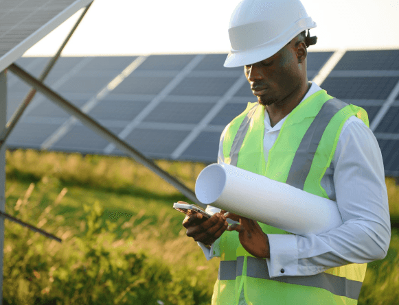 An engineer looking at a device