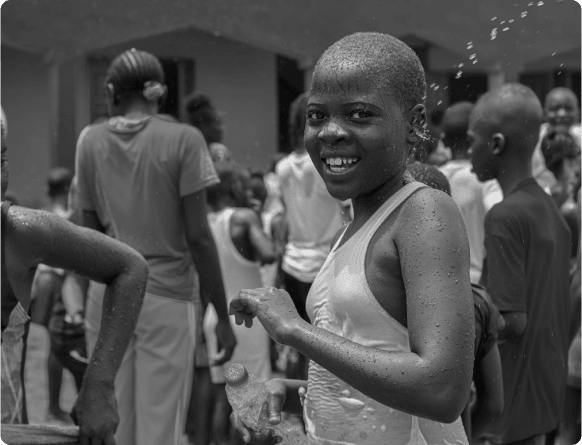 A young girl smiling